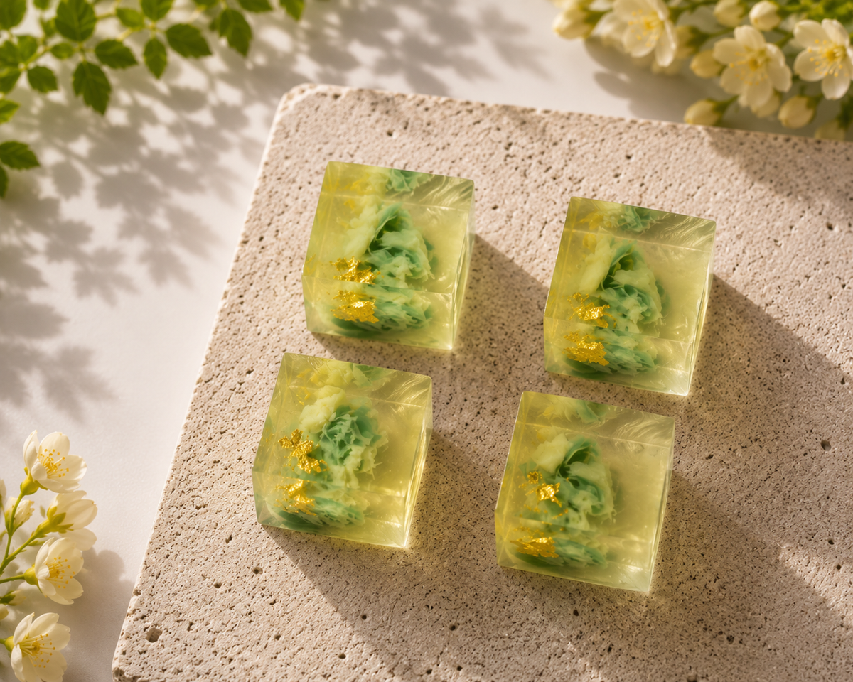 Four handcrafted Jasmine Botanical Jellies featuring unique edible floral designs