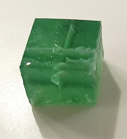 Handcrafted Moringa Botanical Jelly with delicate white edible artwork.
