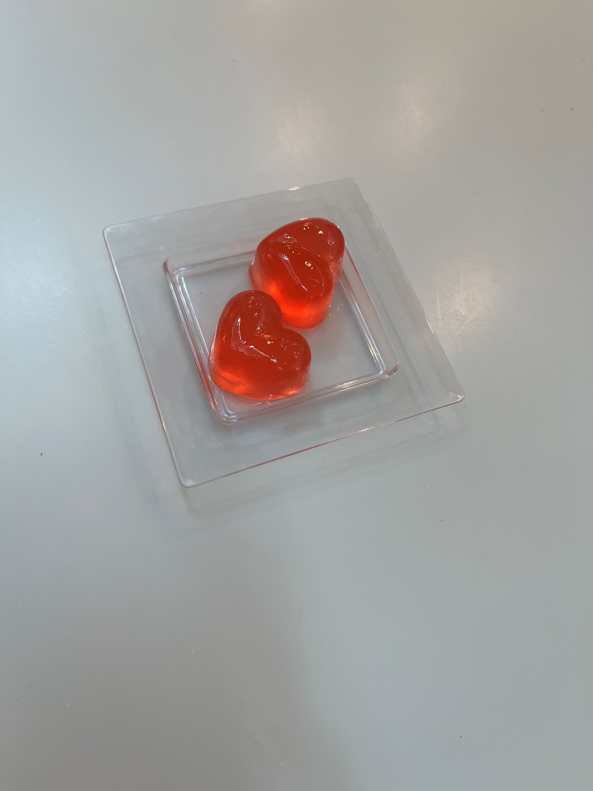 YIXO - two heart shaped vegan watermelon & vodka jellies